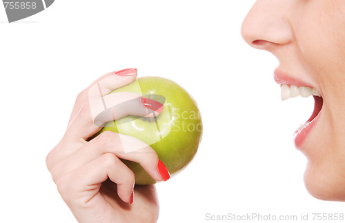 Image of A pretty young woman holding an apple 