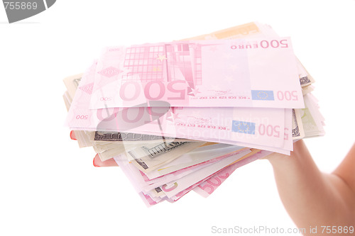 Image of Female hand holding Euro and Dollars bills