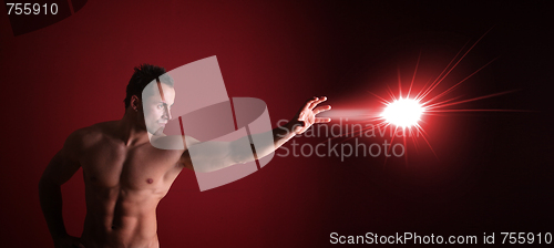 Image of a portrait of a man with a light on the hand