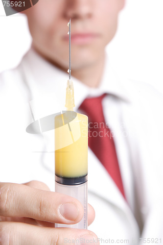 Image of doctor holding syringe