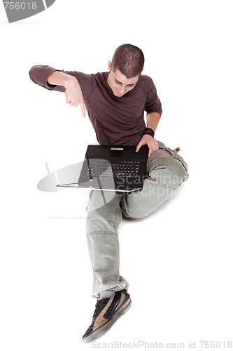 Image of relaxed man with laptop