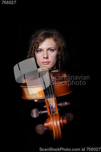 Image of Young woman playing violin