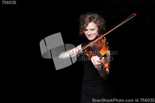 Image of Young woman playing violin