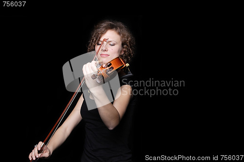 Image of Young woman playing violin