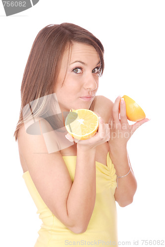 Image of happy model eating an orange