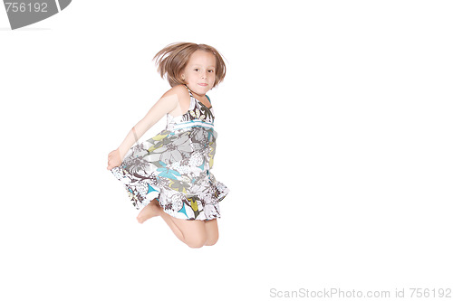 Image of Little girl jumps 