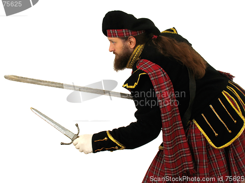 Image of Scottish warrior with sword and dagger