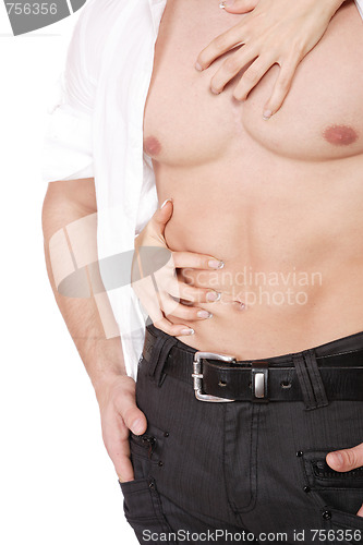 Image of Woman's hands on a sexy man