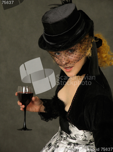 Image of Lady with glass of wine