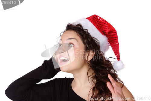 Image of young woman wearing christmas hat