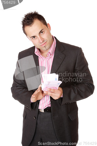 Image of Portrait of a business man holding money 