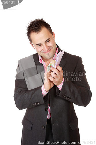 Image of Portrait of a business man holding money 