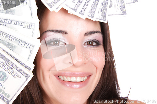 Image of Attractive woman takes lot of 100 dollar bills