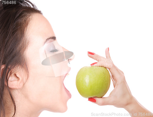 Image of A pretty young woman holding an apple 