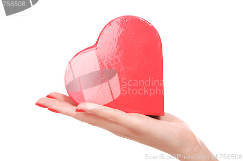 Image of Woman holding red heart in the hand