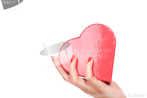 Image of Woman holding red heart in the hand