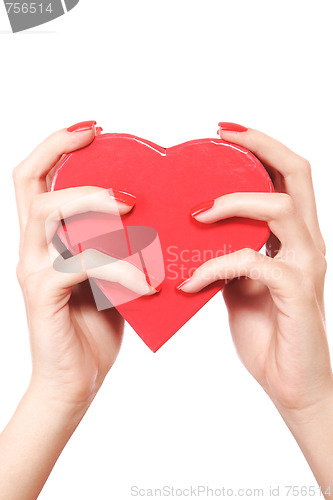 Image of Woman holding red heart in the hand