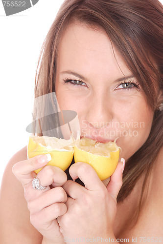 Image of happy model eating a Lemon