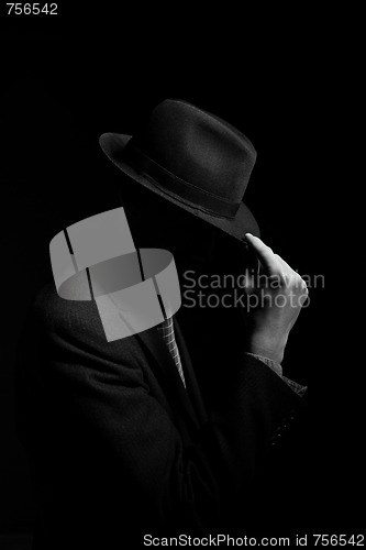 Image of a man in a grey hat