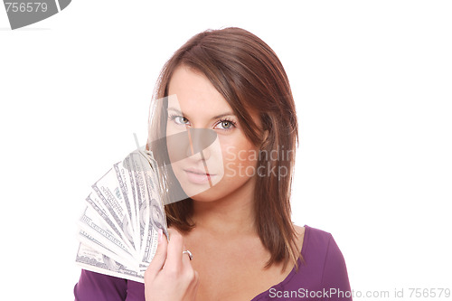Image of Attractive woman takes lot of 100 dollar bills