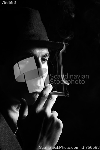 Image of a man in a grey hat