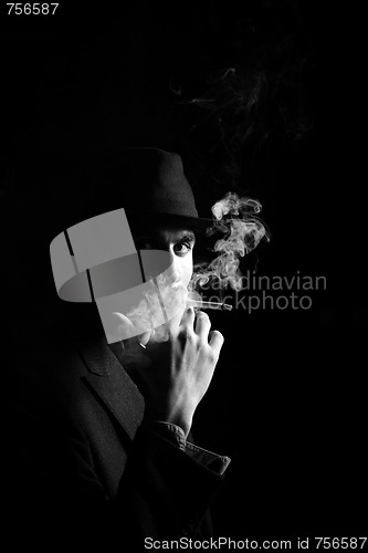 Image of a man in a grey hat