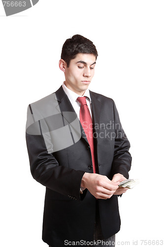 Image of Portrait of a business man holding money 