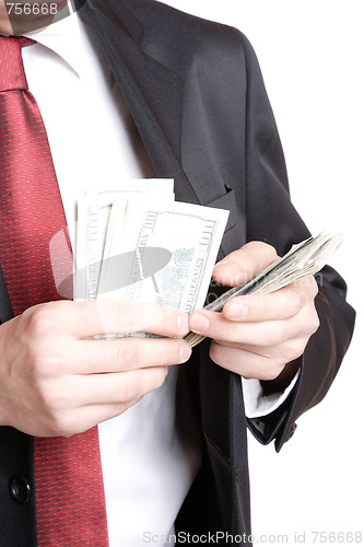 Image of Portrait of a business man holding money 