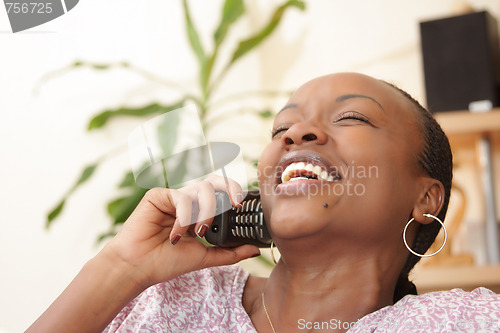 Image of Picture of a happy woman on the phone