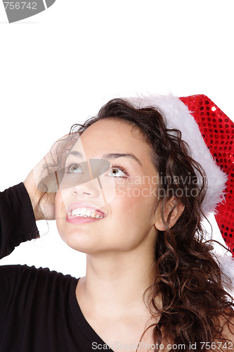 Image of young woman wearing christmas hat