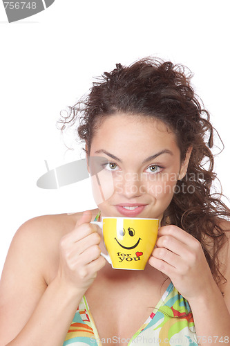 Image of Young woman with a cup