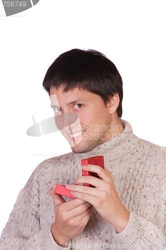 Image of young man with a gift box
