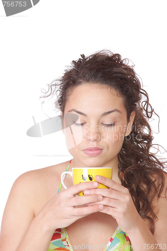 Image of Young woman with a cup