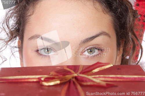 Image of Girl Holding Christmas Gift