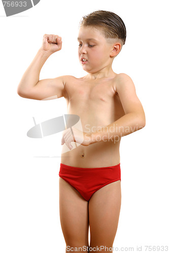 Image of Boy flexing biceps muscles