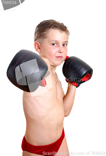 Image of Boy boxer throwing a punch