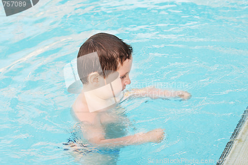 Image of Little boy in water