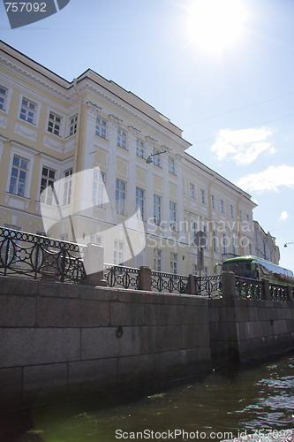 Image of Sun shining over old building