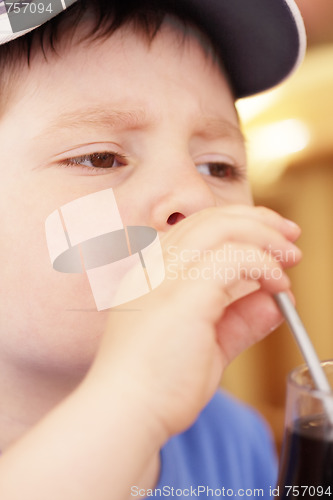 Image of Boy with cold drink