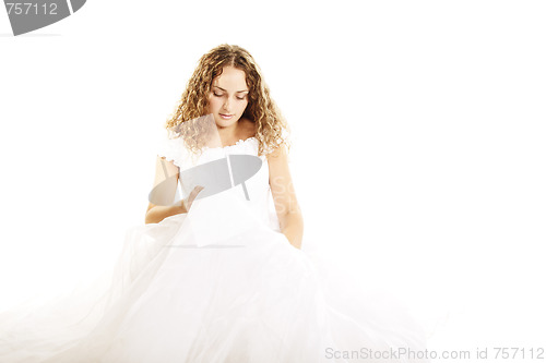 Image of Curly bride in wedding dress