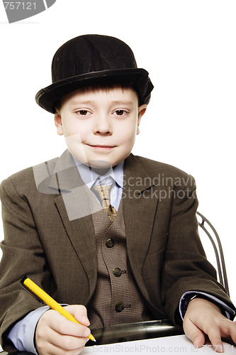 Image of Boy in bowler with yellow pen