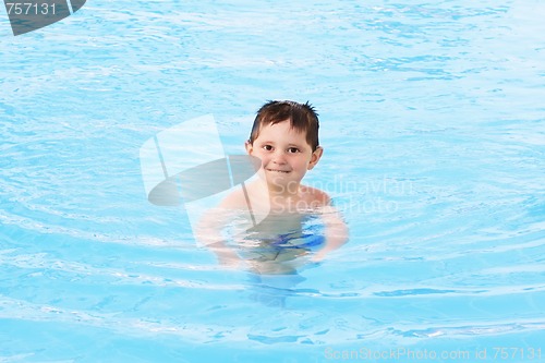 Image of Smiling boy in water