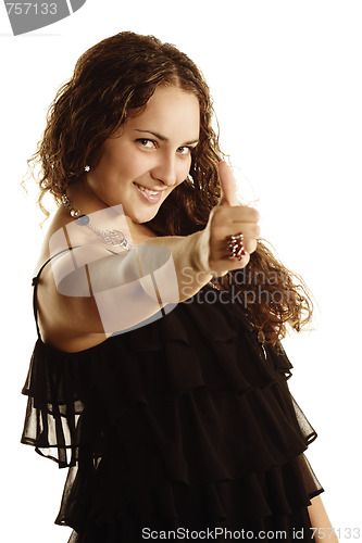 Image of Curly woman with thumb up