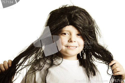 Image of Smiling boy in wig