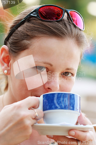 Image of Woman with cup of coffee