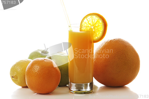 Image of Fresh juice and fruits in counterlight