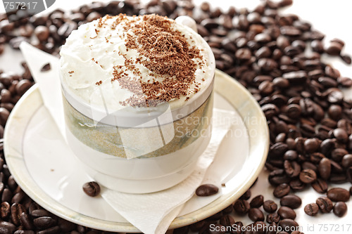 Image of Cappuccino coffee on beans
