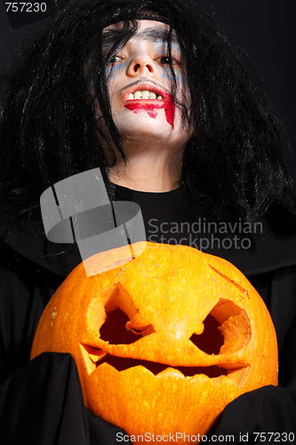 Image of Vampire with pumpkin