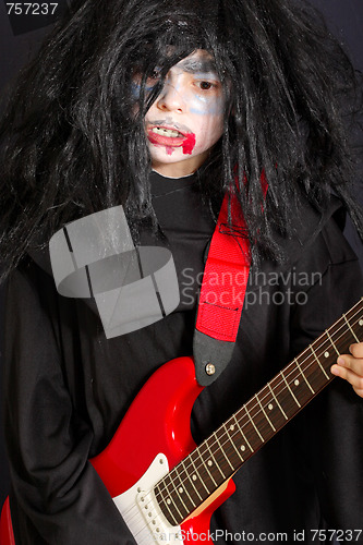 Image of Vampire with guitar