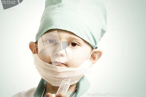 Image of Little serious doctor boy